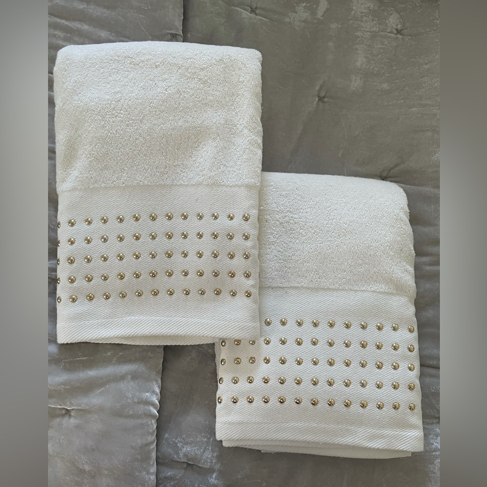 Pair of White Decorative Bath Towels with Gold Metal Embellishments